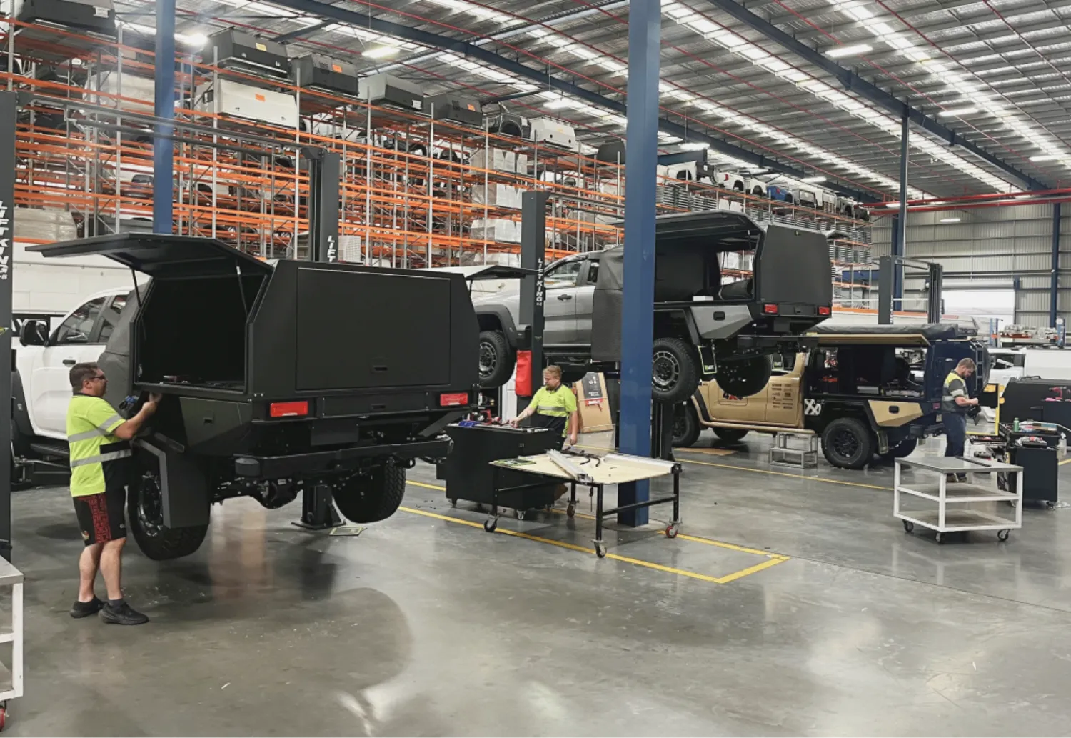 Ford utes fitted with MRT canopies on the production line inside MRT's manufacturing facility